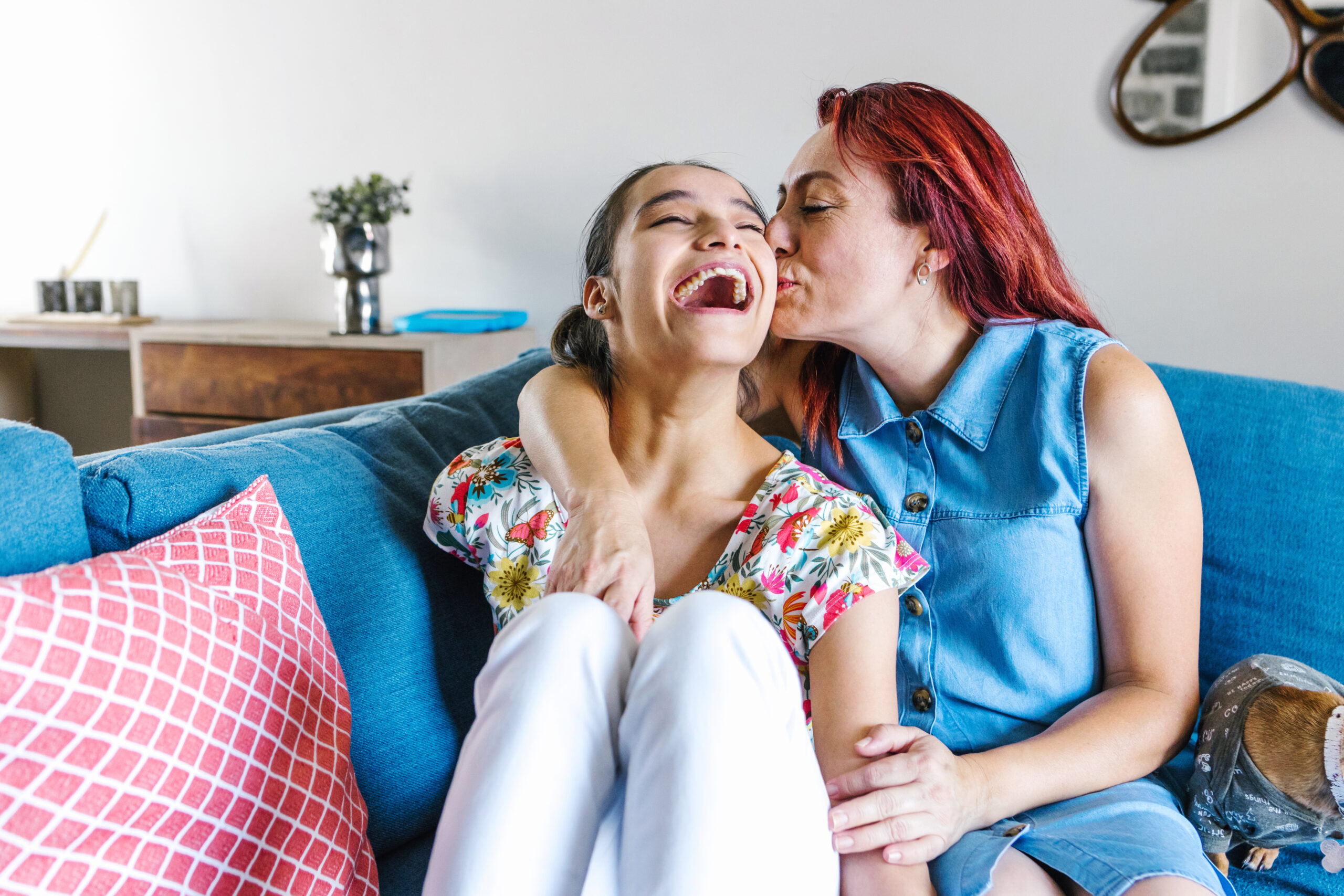 Latin mother and her daughter with cerebral palsy enjoying time together