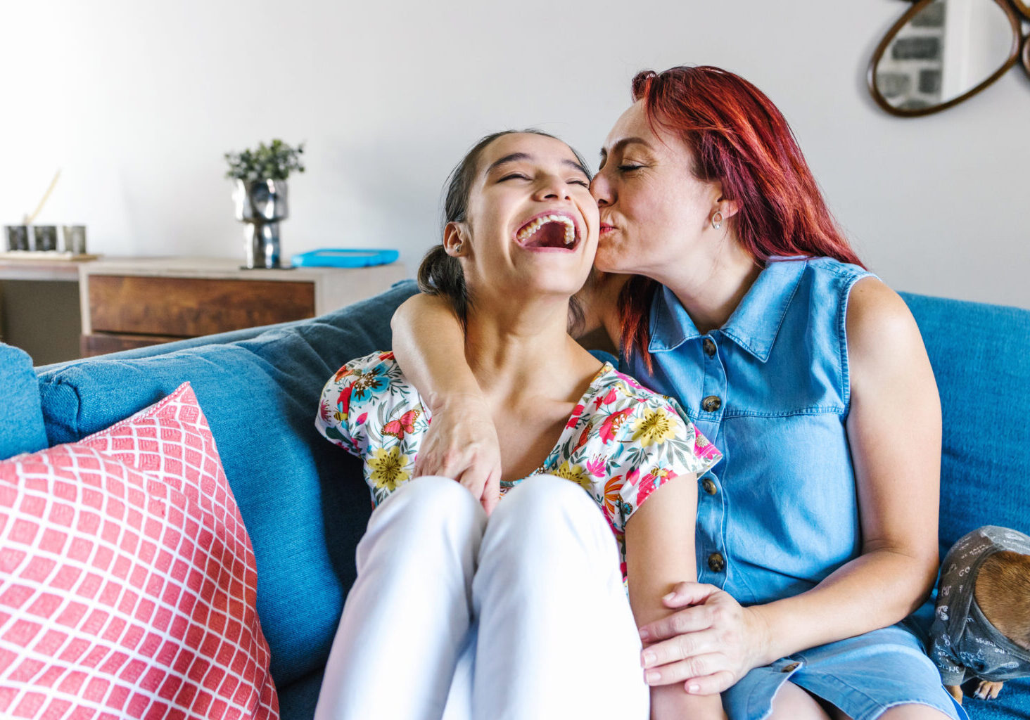 Latin mother and her daughter with cerebral palsy enjoying time together